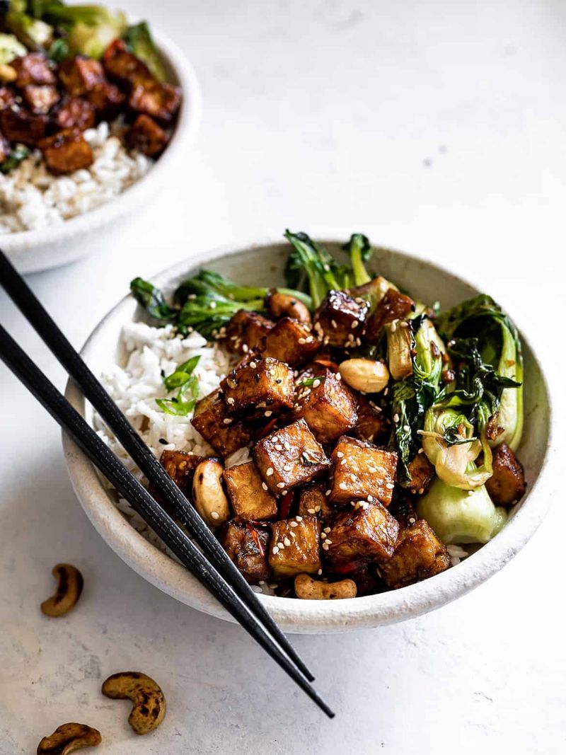 Stir-fried tofu with sesame and greens