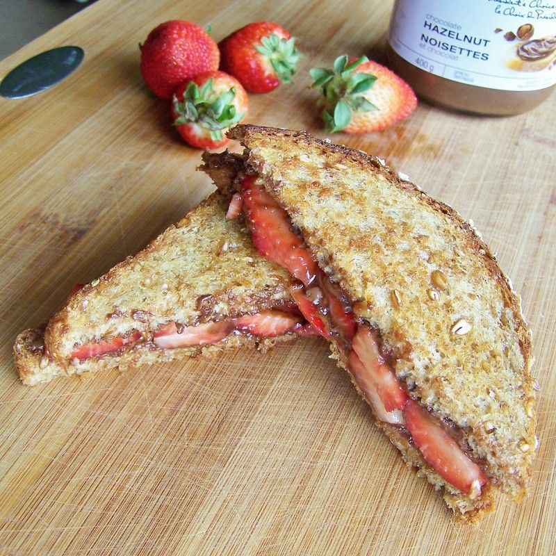 Nutella, Strawberries, Whipped Cream, Powdered Sugar, and Bread