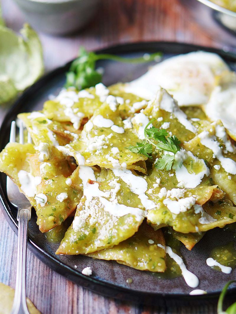 1. Nachos Supreme vs. Chilaquiles Verdes
