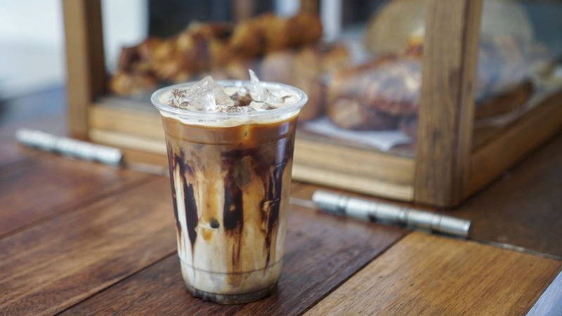 Sweetened coffee drinks with syrups and cream