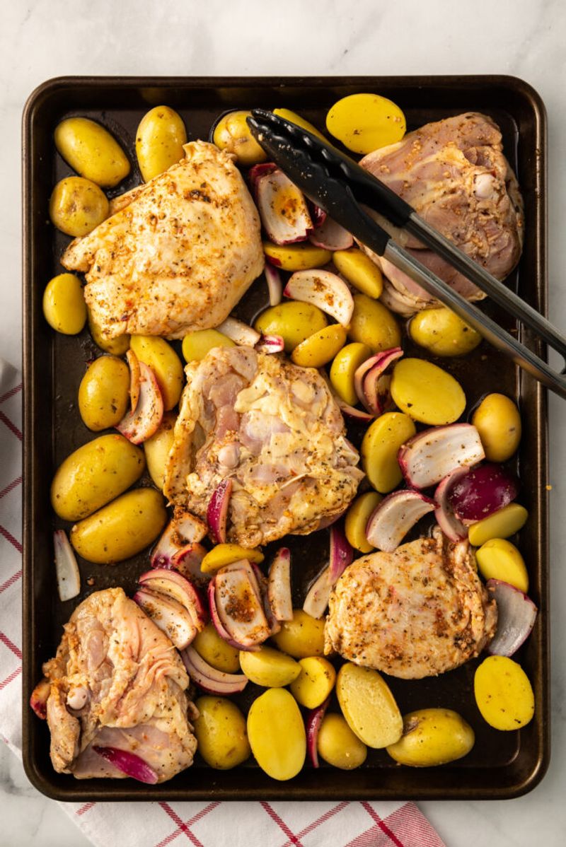 Sheet-Pan Lemon Herb Chicken Thighs and Potatoes