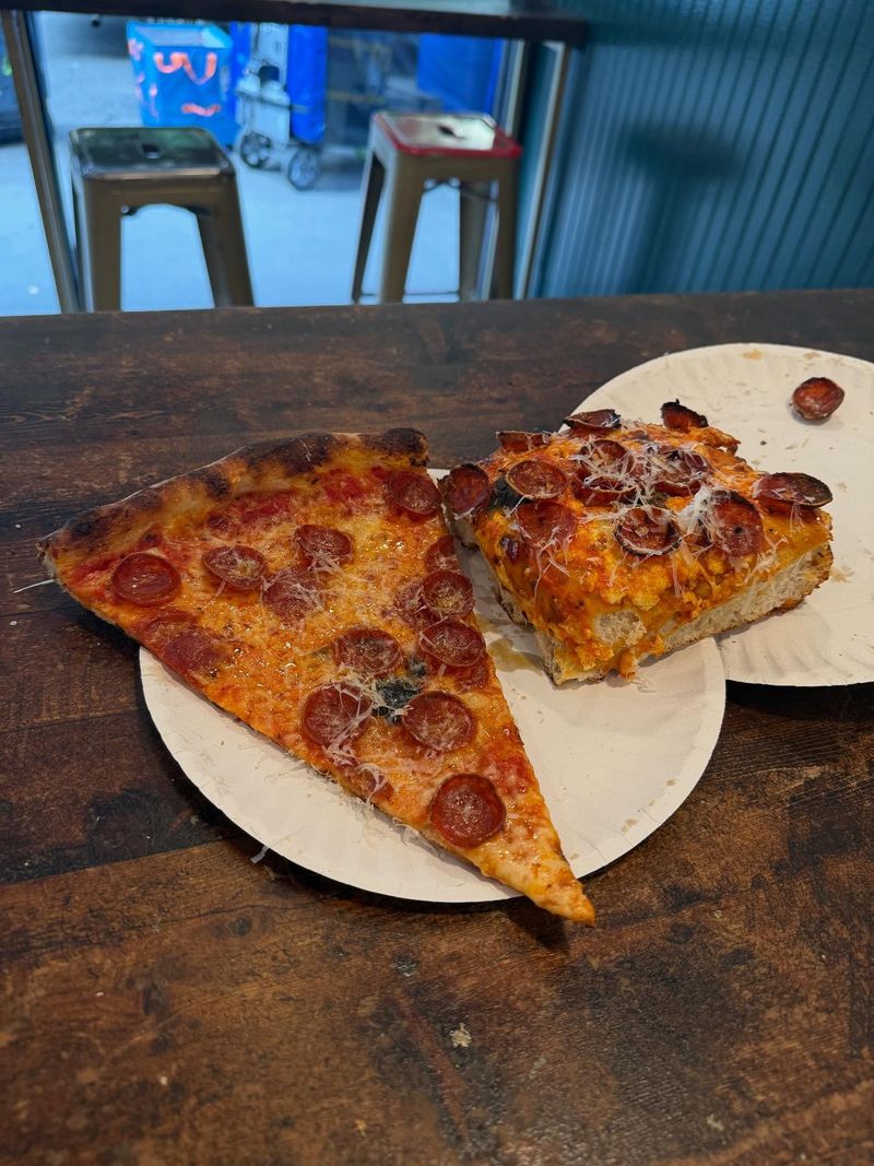 The slice collapses into a soggy fold instantly