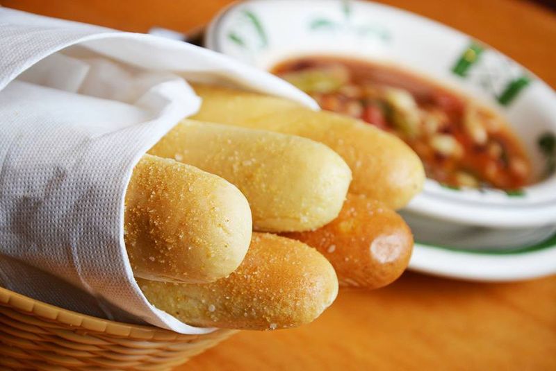 Overfilling on breadsticks before the entrée