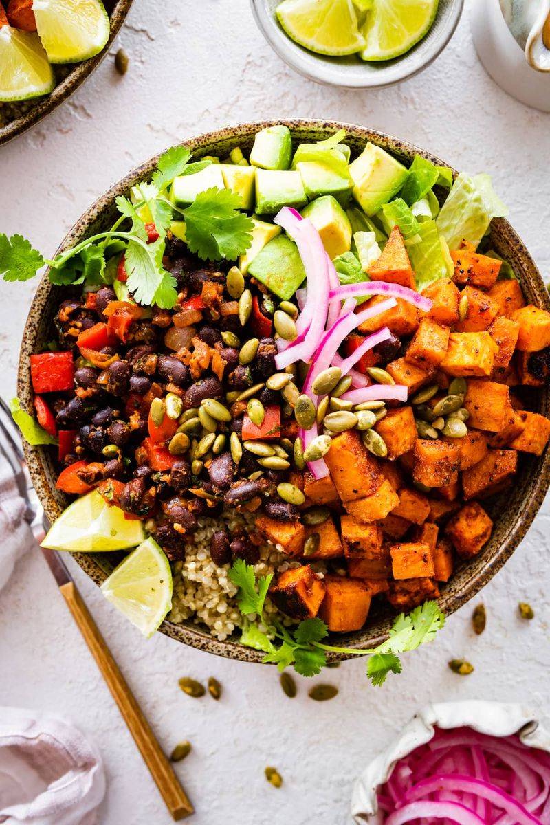Grain bowl with roasted sweet potatoes and black beans