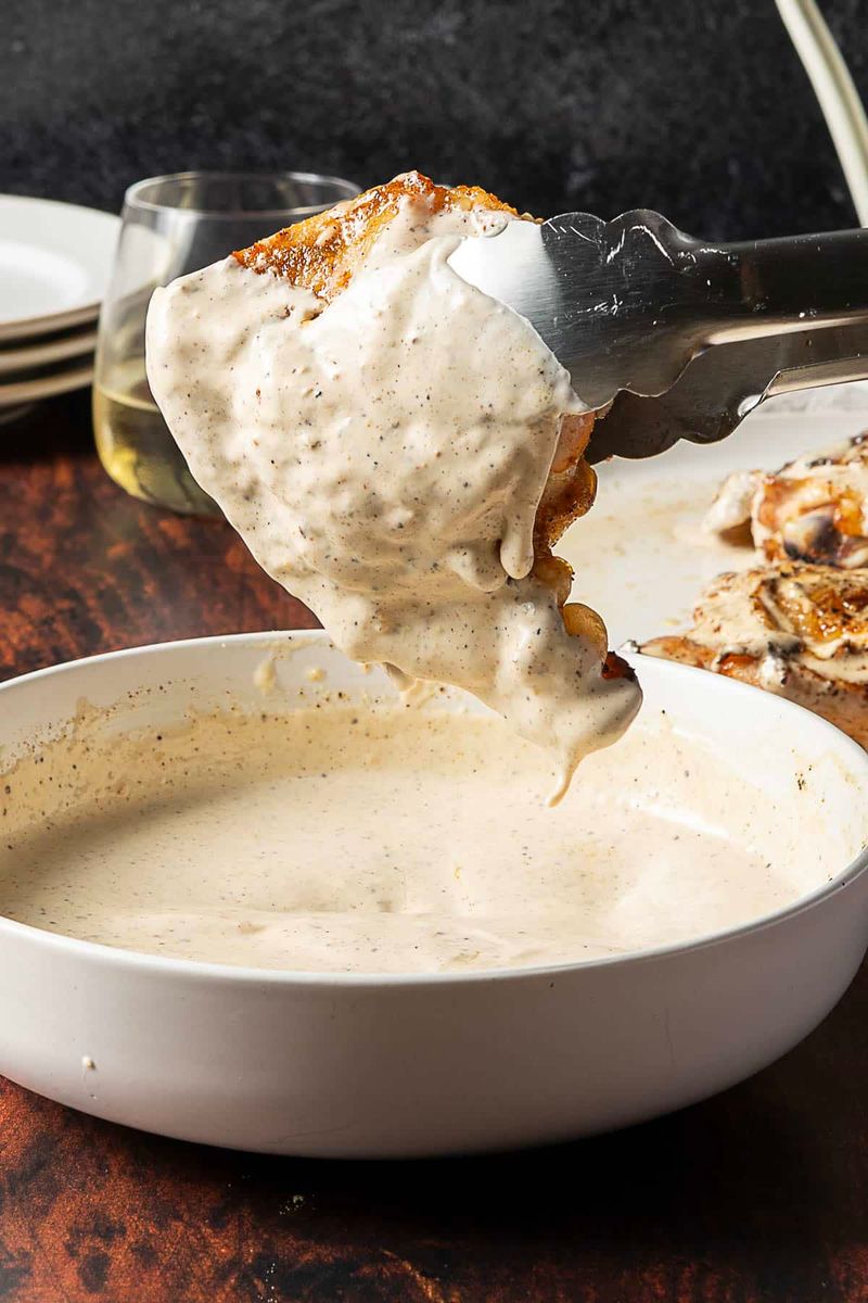 Dunking Chicken In White Sauce