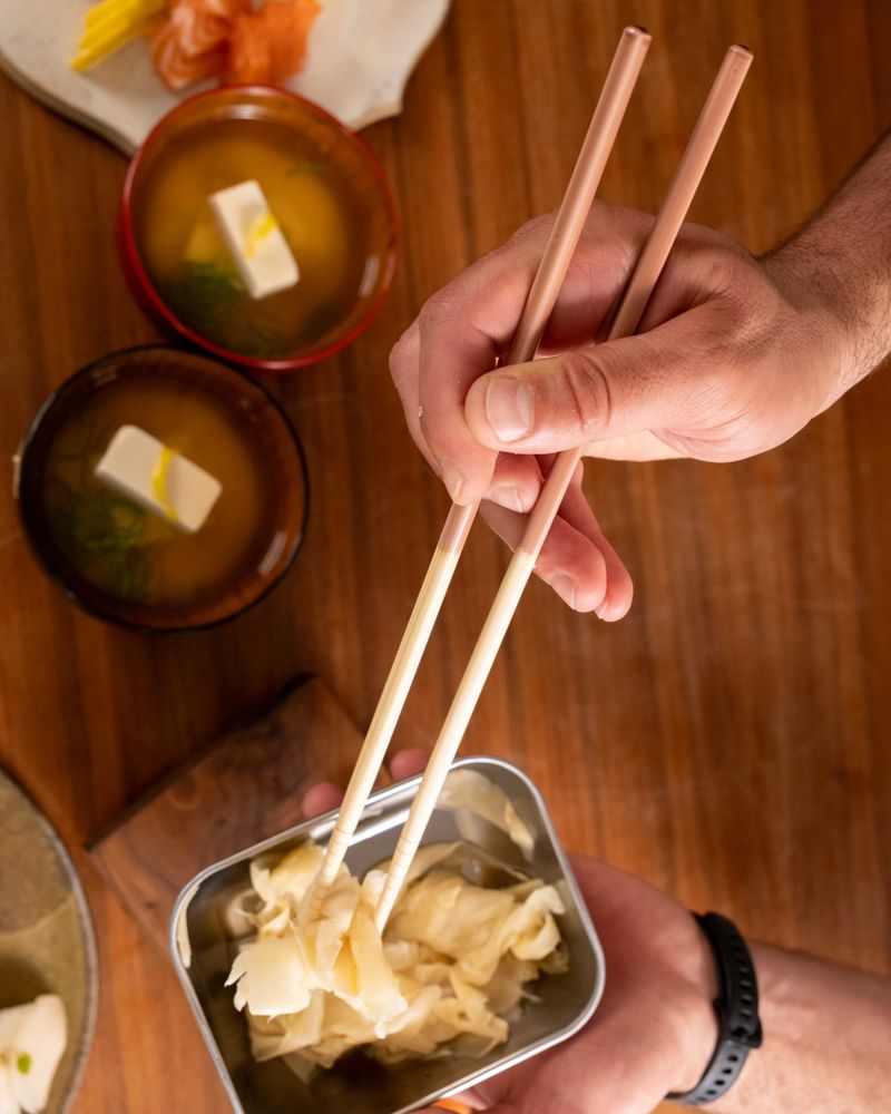 Passing food chopstick-to-chopstick
