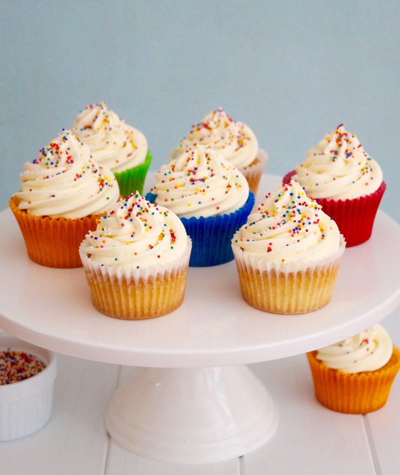 Vanilla Cupcakes With Sprinkles and a Candy Topper