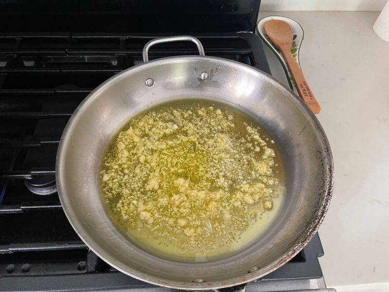 Adding garlic at the start for long sautés