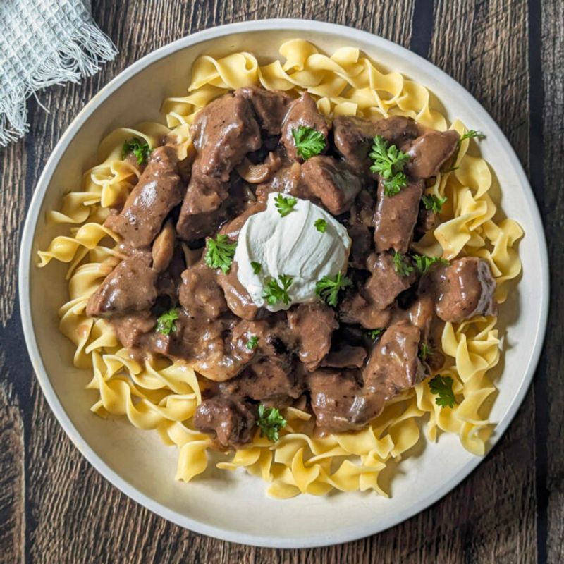 Beef Stroganoff Served Over Buttery Egg Noodles