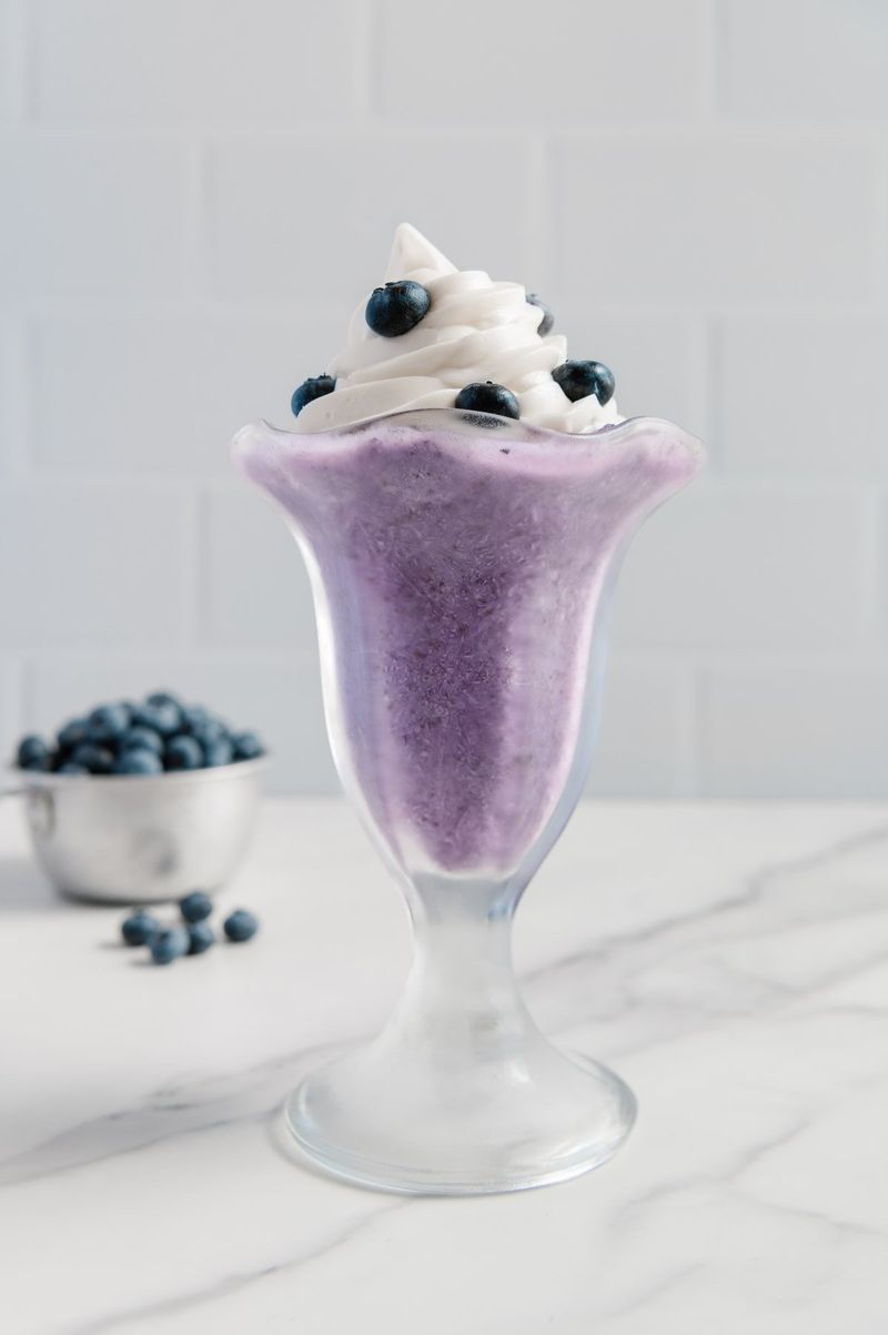 Frozen berries with a splash of milk