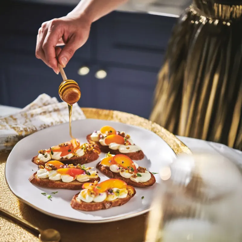 Crostini with whipped ricotta and honey