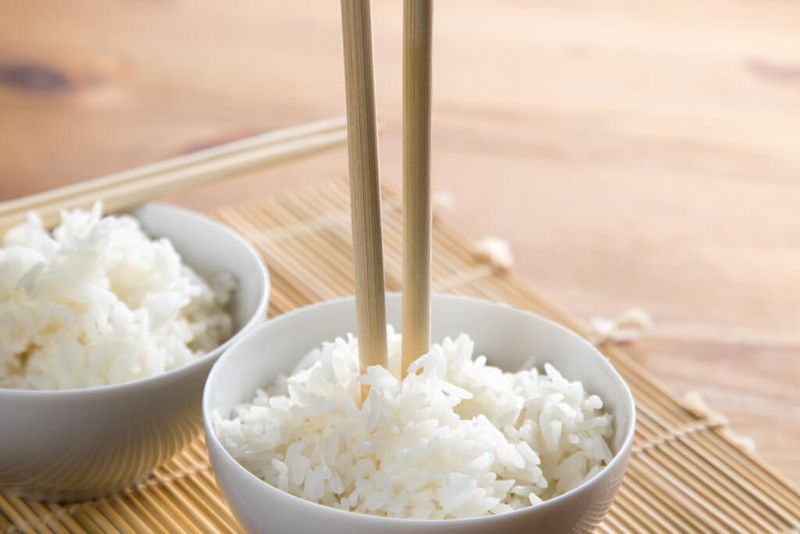 Sticking chopsticks upright in rice