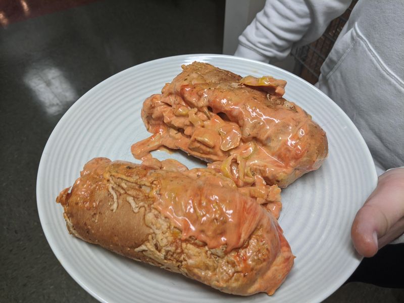 Saucing the outside of the bread