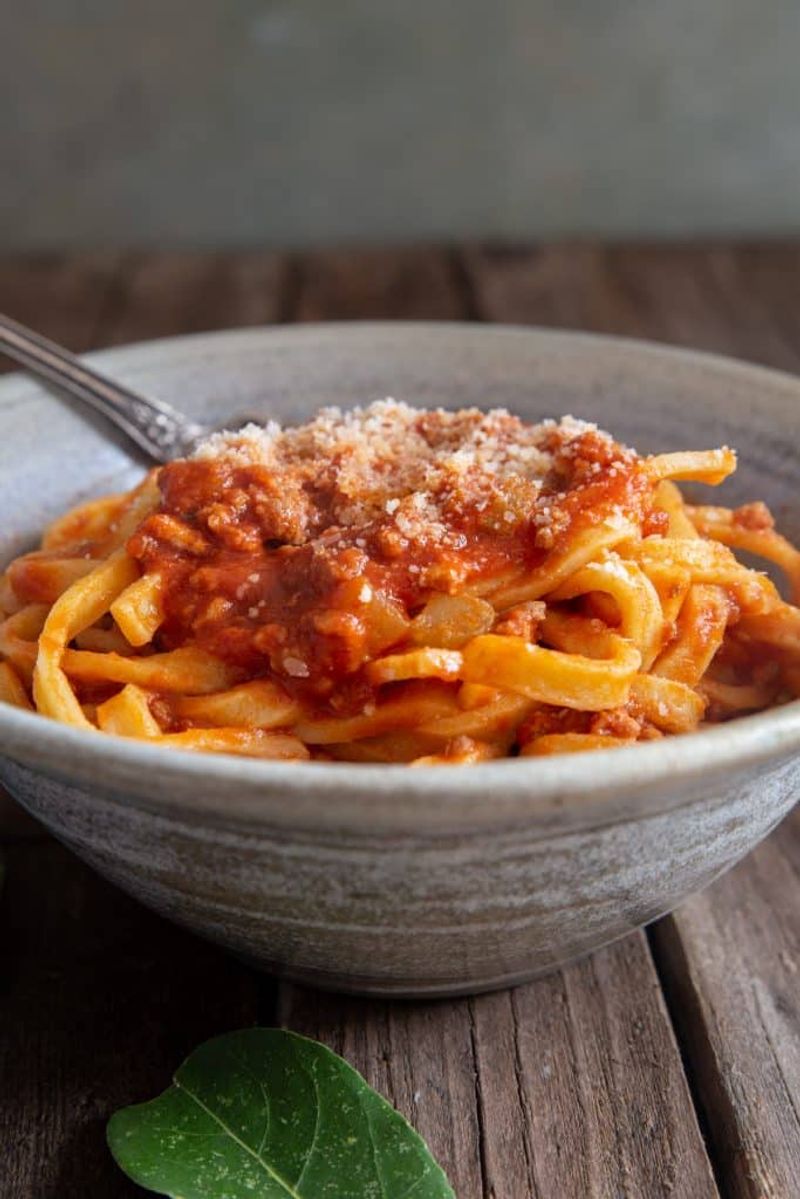 Bright red, tomato-forward “Bolognese”