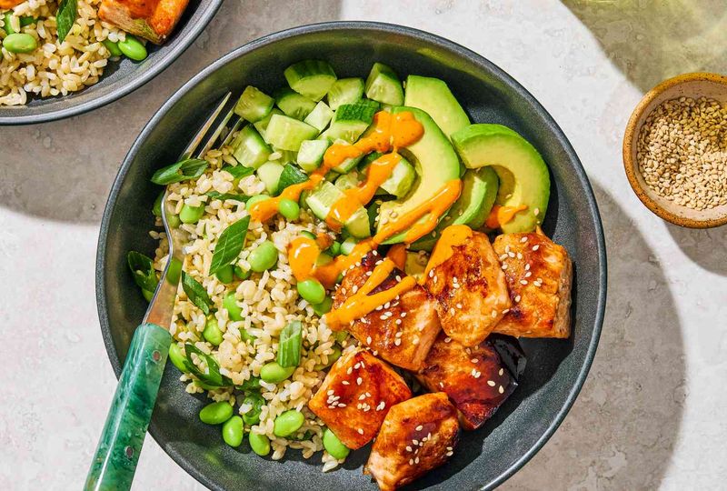 Salmon bowls with rice and crunchy veggies