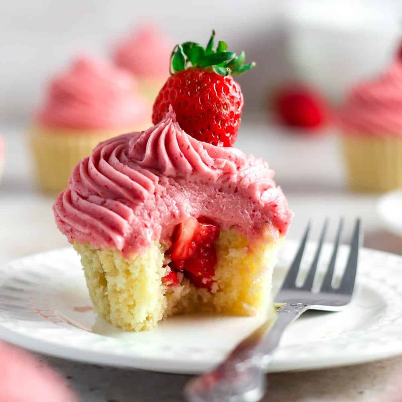 Vanilla Cupcakes With Strawberry Jam Center