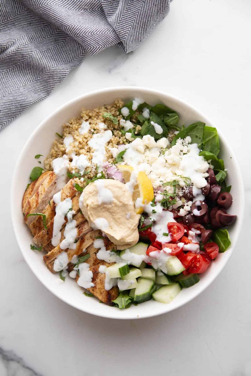 Chicken quinoa bowl with a tahini drizzle
