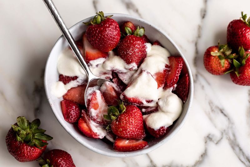 Strawberries and whipped cream dip bowl