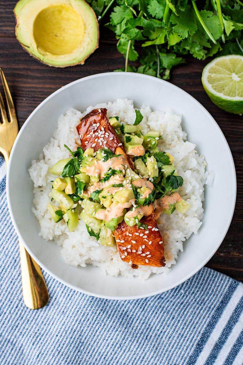 Salmon bowls with rice and cucumber