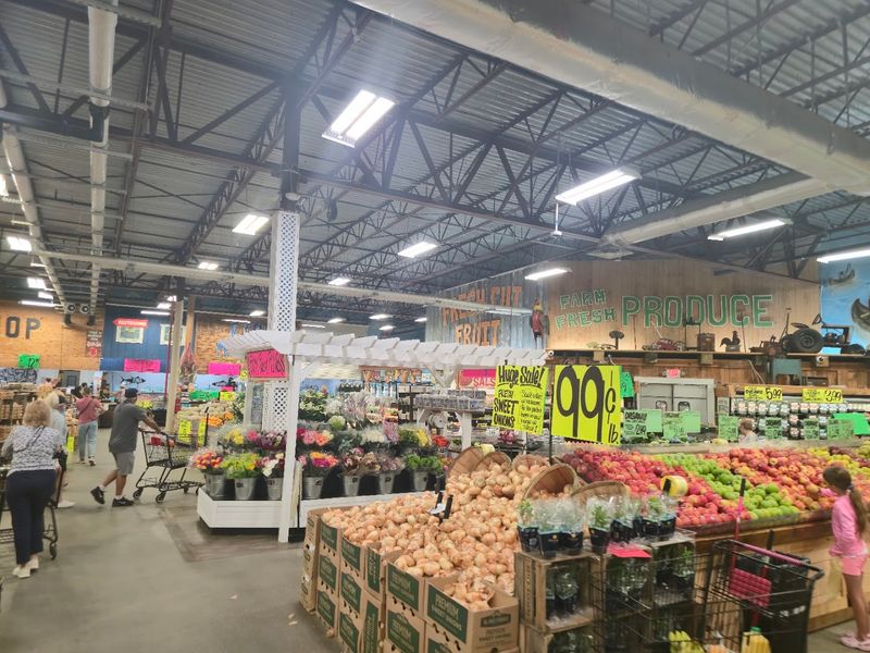 Over 100 Cheeses Including a Towering Parmigiano Display