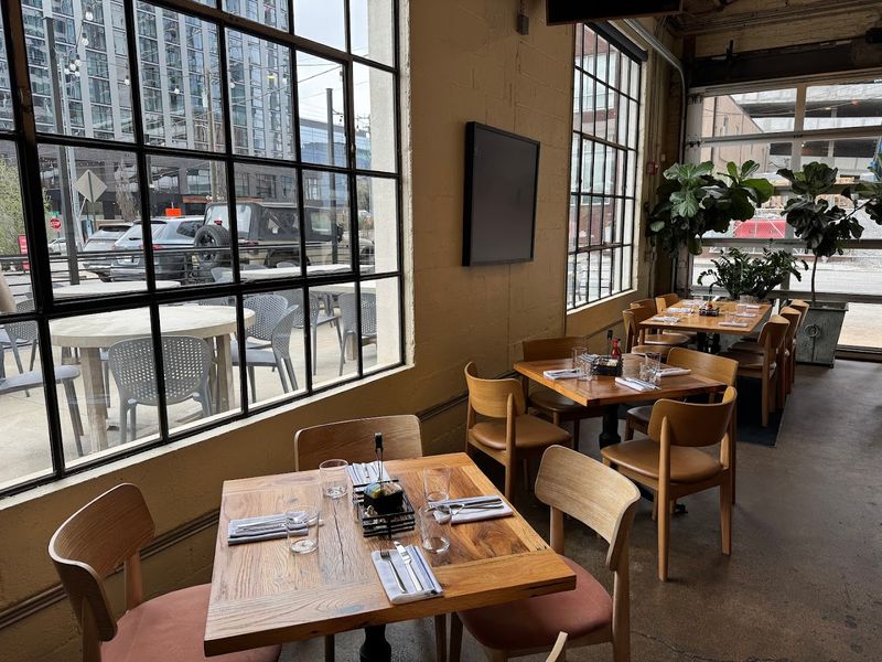 A dining room and patio built for lingering