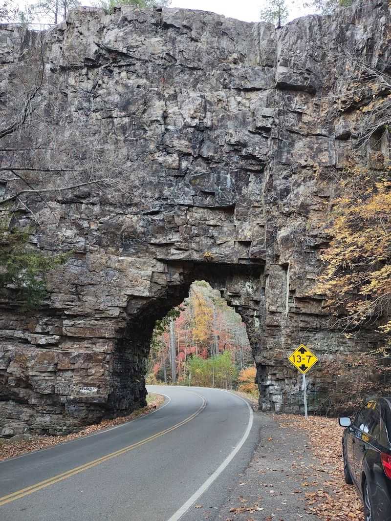 A Massive Rock Formation With a Surprisingly Small Tunnel