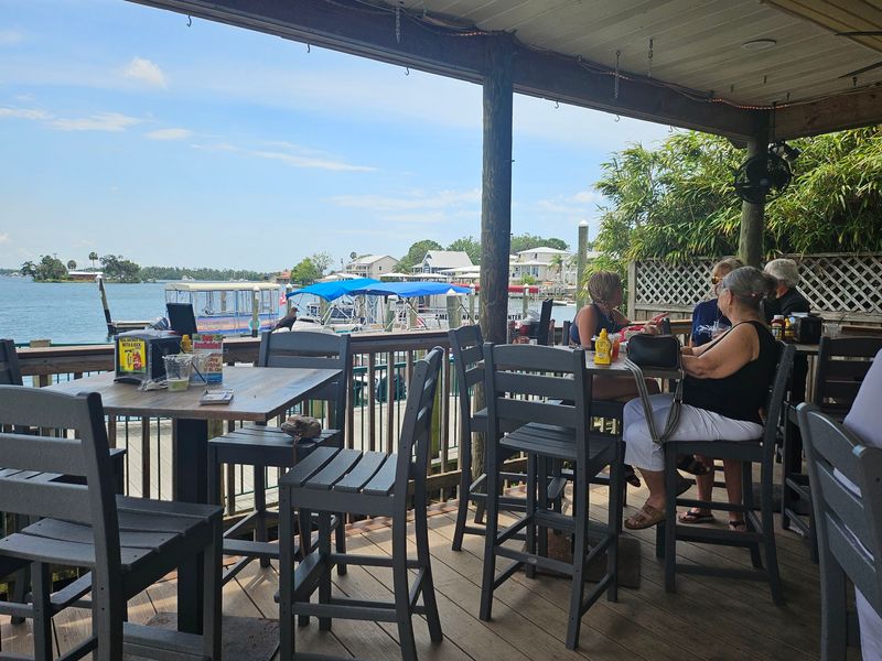 Waterfront Deck Seating With Working Boat Traffic