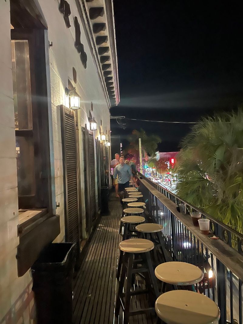 People-Watching Olympics From the Second-Floor Balcony