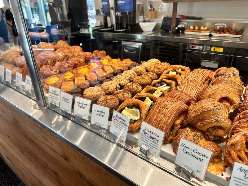 Yogurt Bowl With A Croissant On The Side