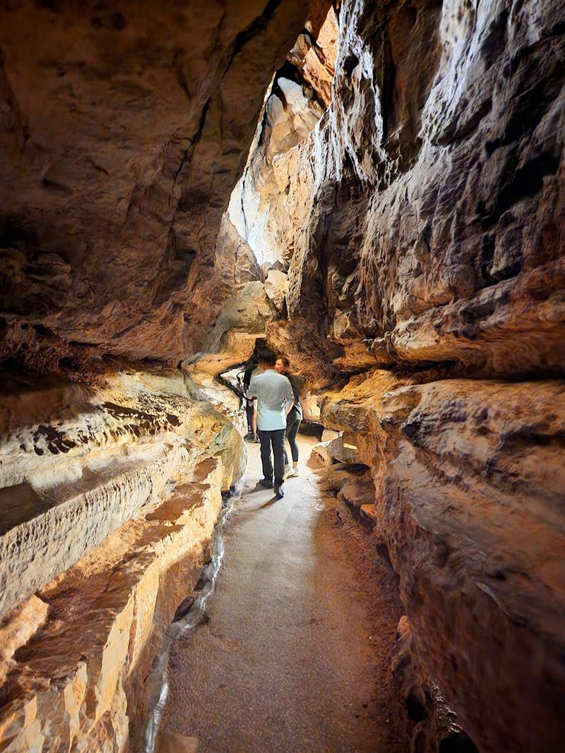 Walking Through the Cave to Reach the Falls