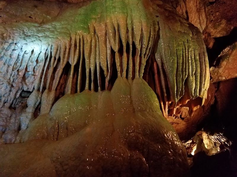 Inside, the cave feels cool, wet, and wonderfully otherworldly