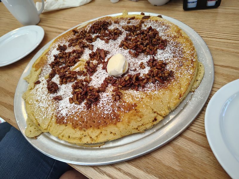 Grab A Pizza Cutter Because These Pancakes Are Hubcap-Sized
