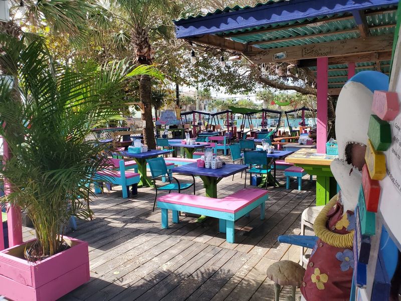 Outdoor Seating With Ocean Breezes and Palm Trees