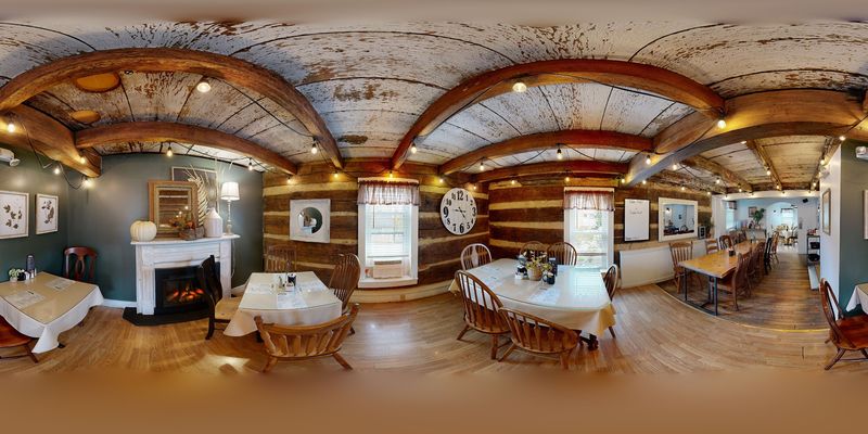 A Restored 19th Century Log Cabin Setting