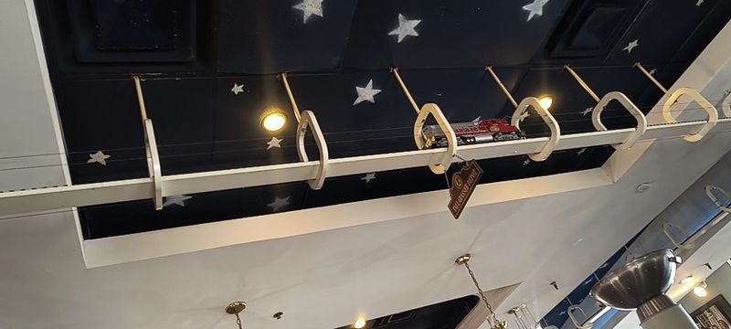 The Charming Diner Atmosphere With a Train Overhead