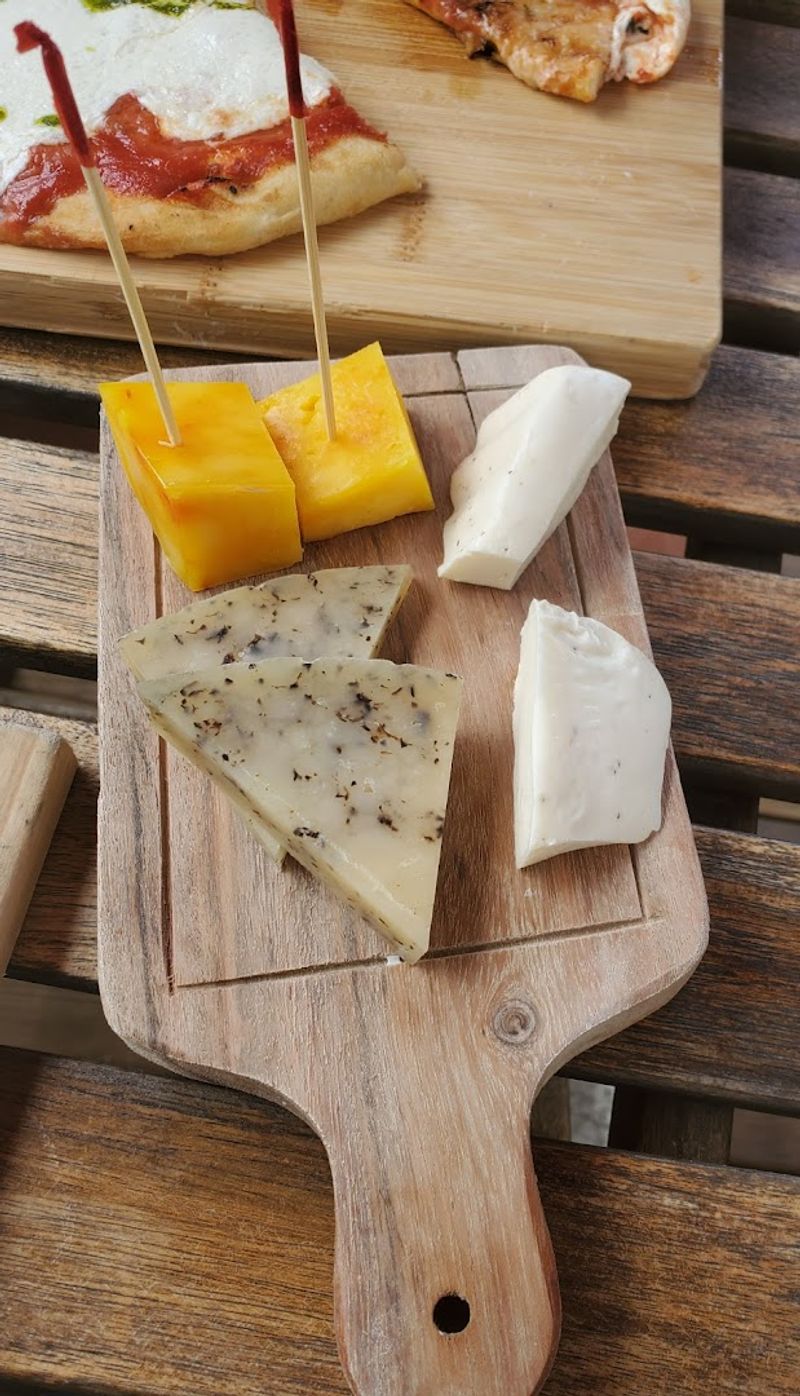 The Complimentary Cheese Board Tradition