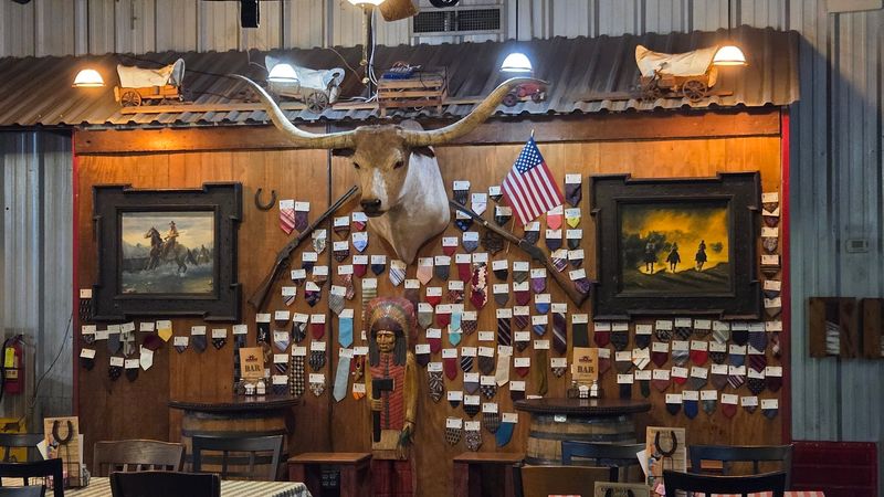 Servers in Authentic Western Wear and Cowboy Hats