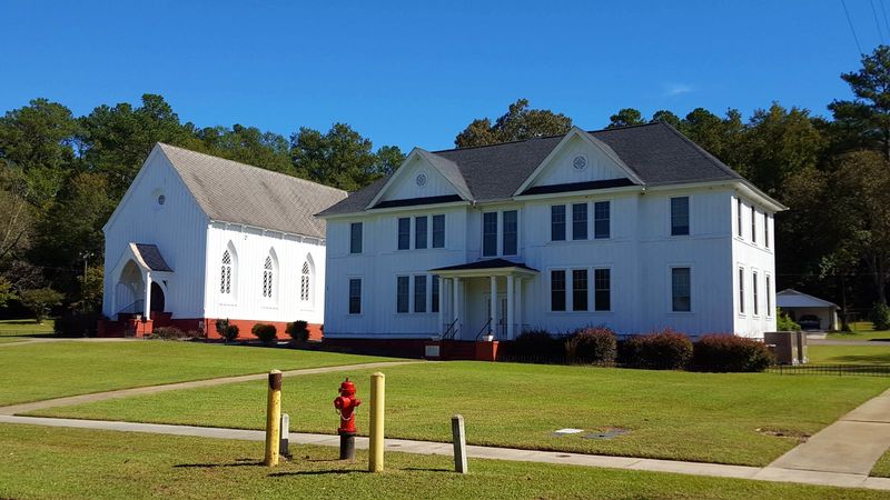 Rows of Carpenter Gothic Cottages Along Gregg Street