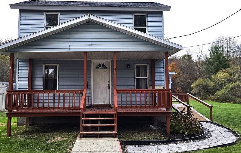 Porch Chats and Friendly Waves
