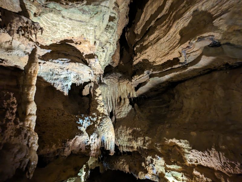 Exploring Forbidden Caverns Without Overspending