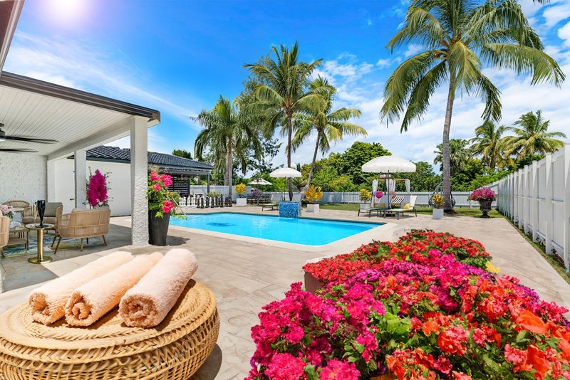 Resort-style villa with heated pool and chic cabana