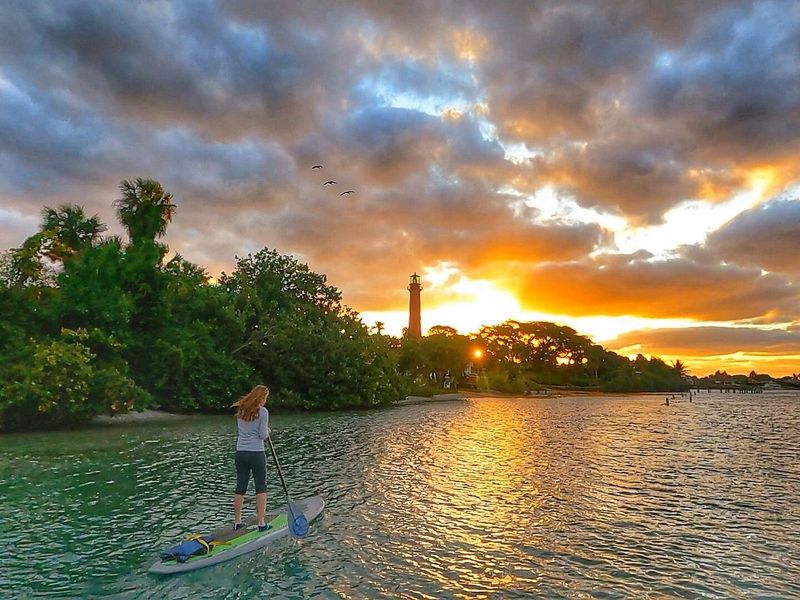 Sunrise paddleboarding at a spring run (Central Florida)