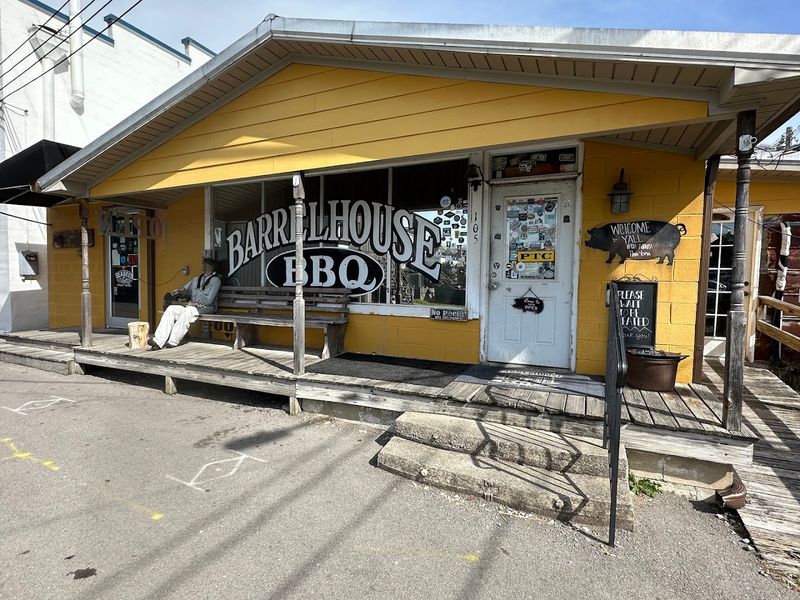 Why First-Time Visitors Fall Hard For This Little Yellow BBQ Spot