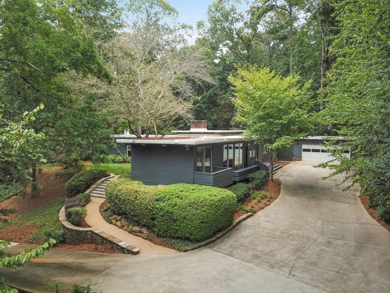 Tour This Iconic Mid-Century Marvel Hidden In The Hills Of Buckhead - Decor Hint Garage & Driveway Preserve Automotive Heritage With Period Details