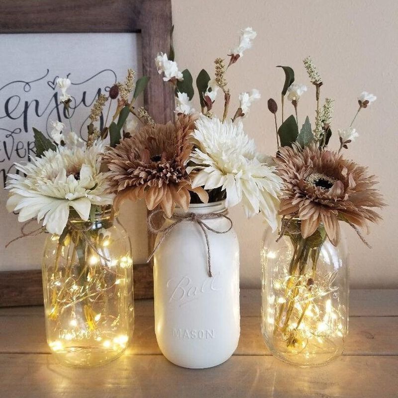 15 Functional And Stylish Farmhouse Living Room Ideas (Plus 5 You Will Absolutely Love) - Decor Hint Mason jar centerpiece decor