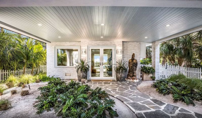 12 Coastal-Inspired Curb Appeal Ideas Seen In California Homes (And 3 That Are Losing Charm Fast) - Decor Hint Seashell Mosaics (Losing Charm)