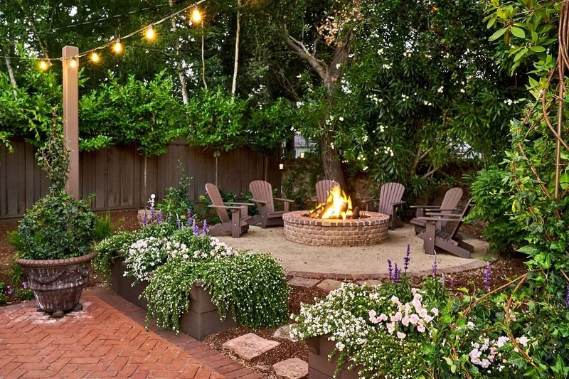 Charming Outdoor Corners That Give Georgia Homes Their Magic - Decor Hint Stone Fire Pits Surrounded by Adirondack Chairs