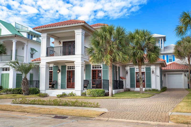 7 Coastal-Inspired Curb Appeal Ideas From Florida, And 5 Even Better Ones - Decor Hint Radiant Shutters That Pop Against Neutral Walls