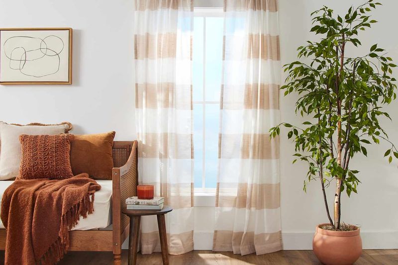 18 Gorgeous Window Treatment Ideas From Joanna Gaines You'll Want To Steal - Decor Hint Subtle Striped Curtains