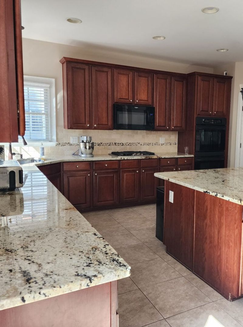 31 Kitchen Elements That Designers Wish Would Disappear For Good - Decor Hint Dark Wood Cabinets Throughout